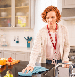 woman cleaning counter
