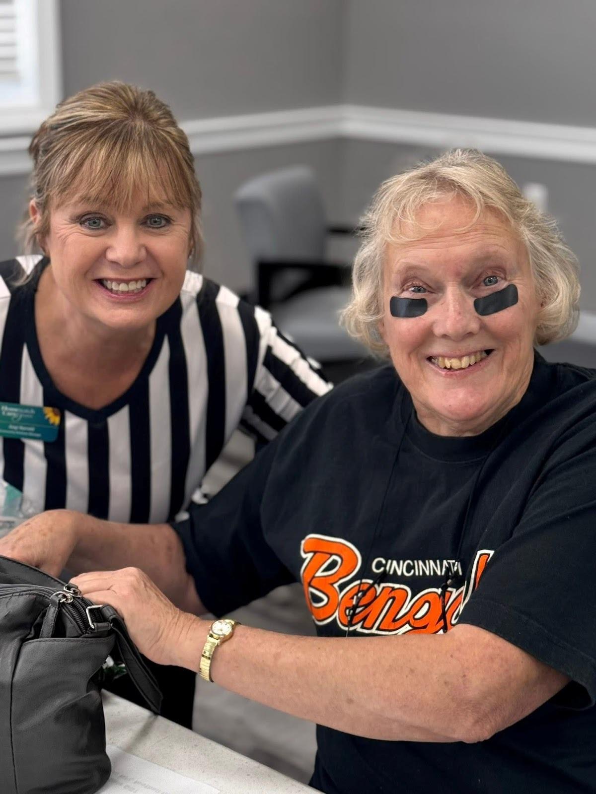 A caregiver assisting a senior