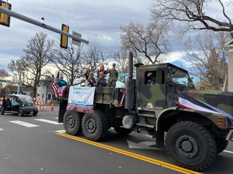 A group of people in a military truck