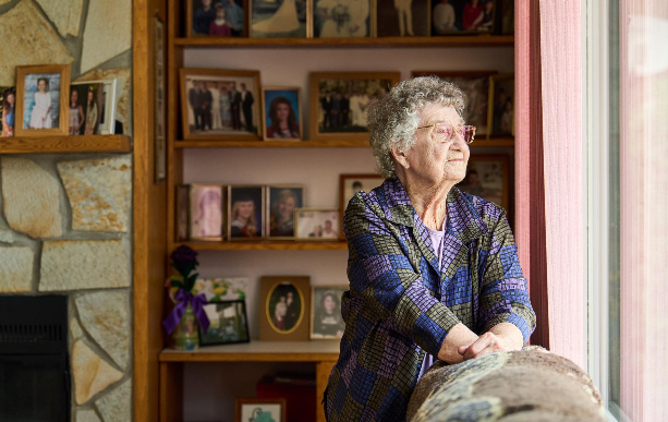 A woman looking out a window