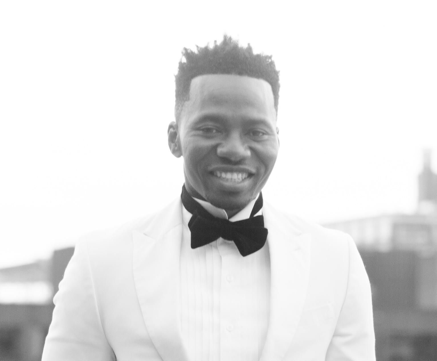 A caregiver walking outside with a patient