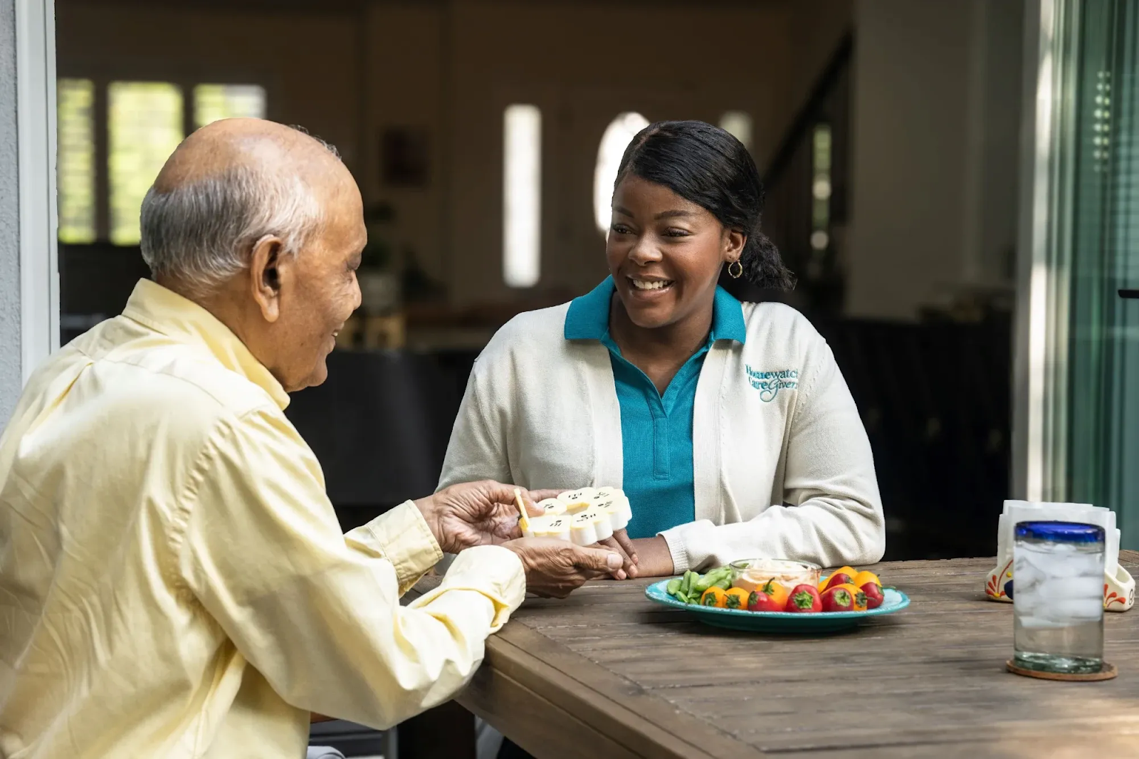 An aide with client