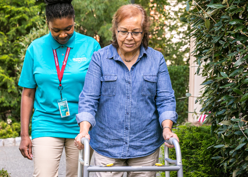 An aide with client