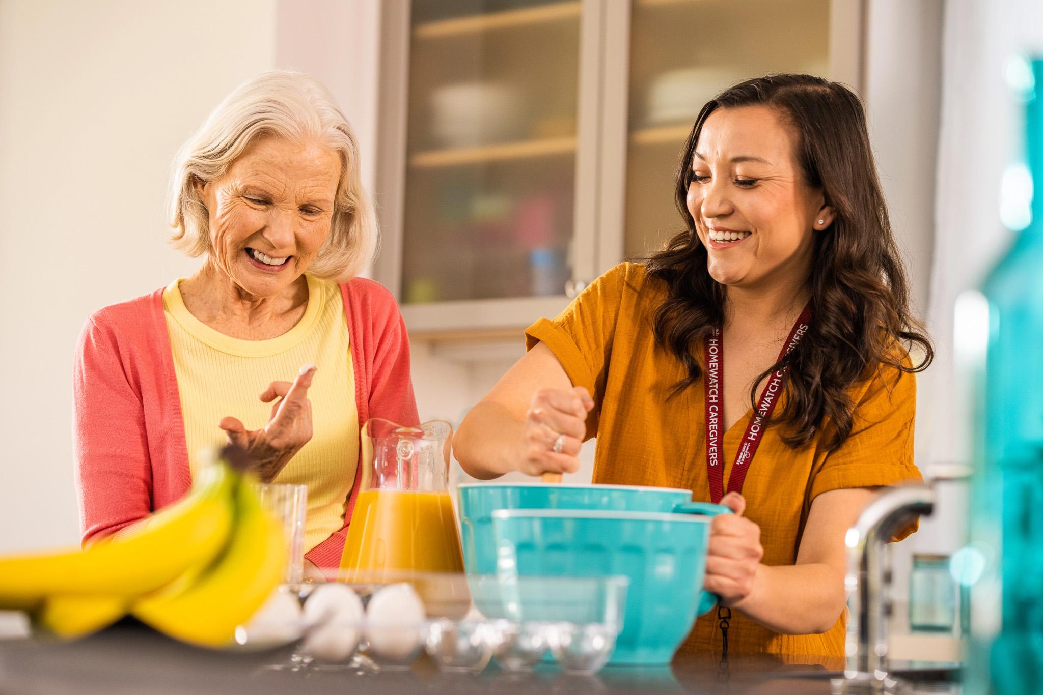 A patient and caregiver making juice