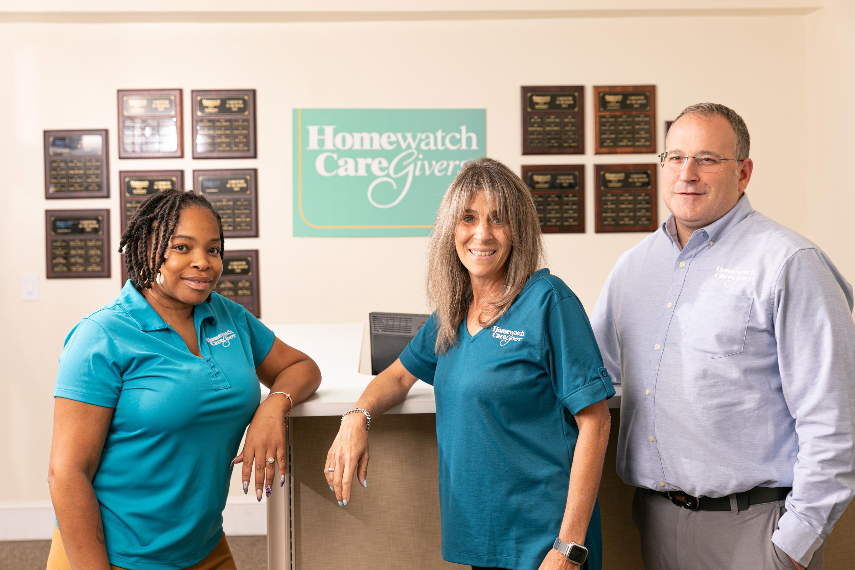 Three Homewatch CareGivers Employees standing next to each other