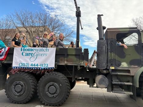 A group of people in a military truck