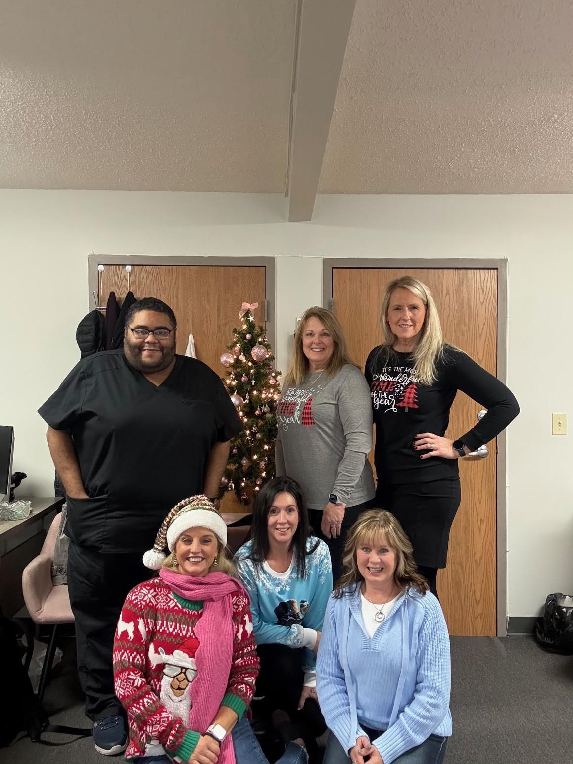 A caregiver walking outside with a patient