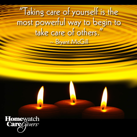 candles and a holiday quote