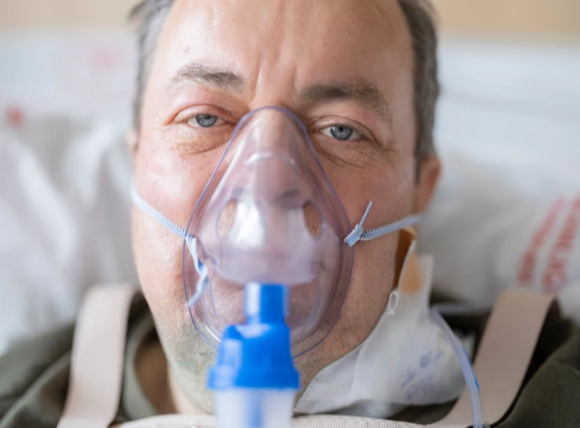 man with oxygen mask on