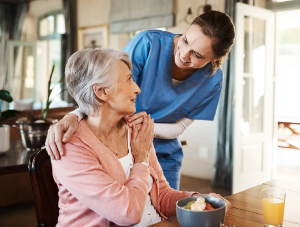 Caregiver holding patients shoulders