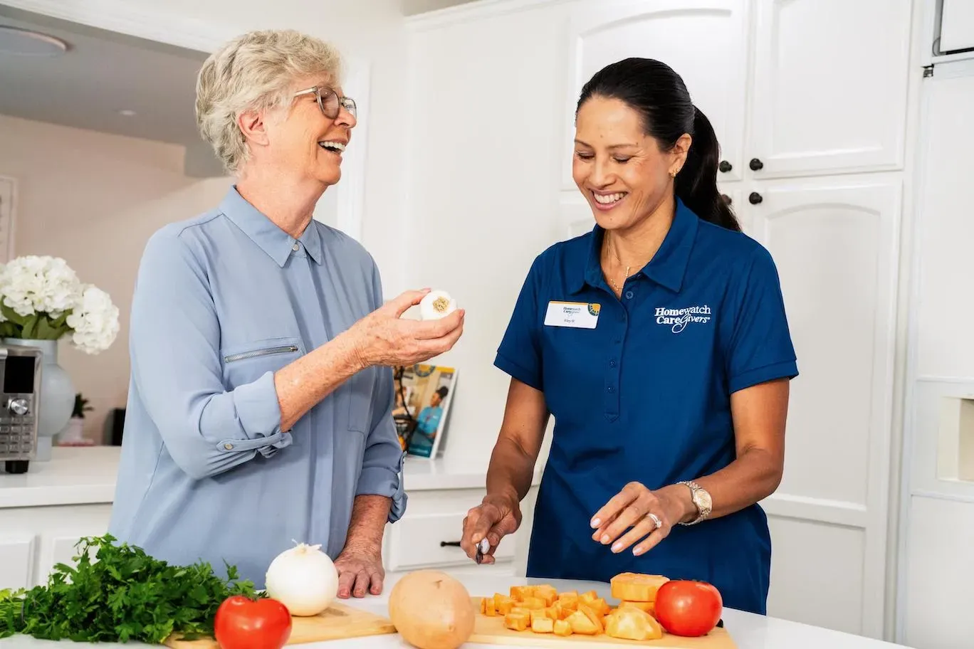 Two women smiling